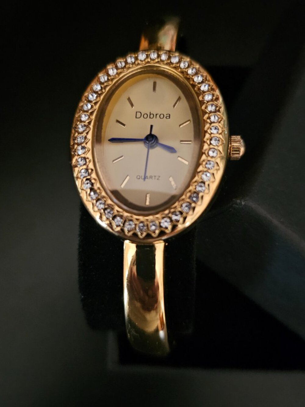 LADIES DOBROA OVAL GOLD TONE QUARTZ WATCH with BRILLIANT ACCENTS